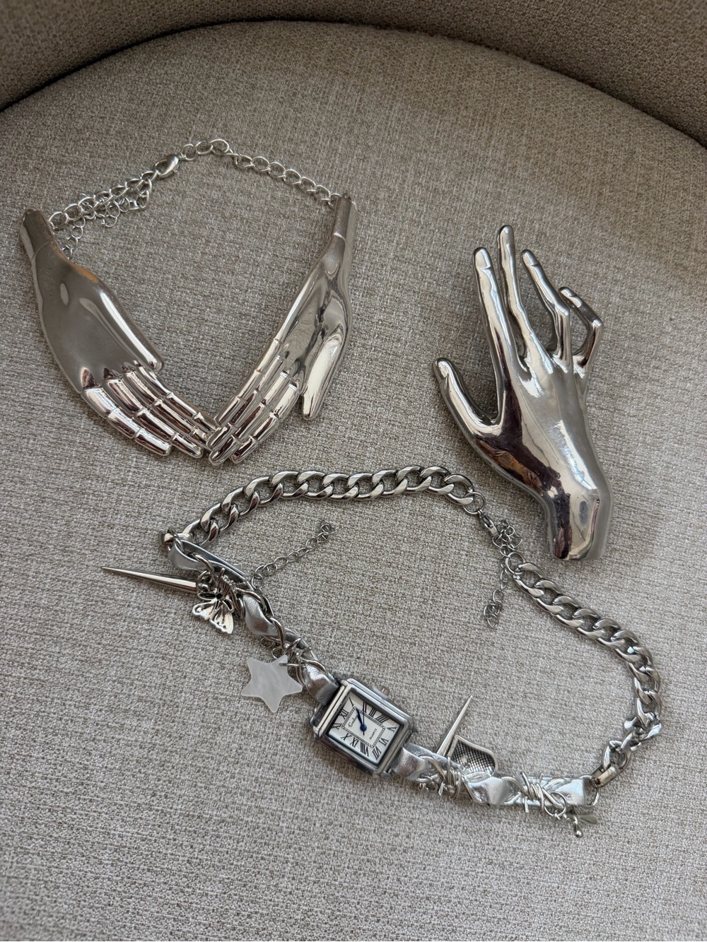 Akira hand necklace with matching broach and watch charm necklace